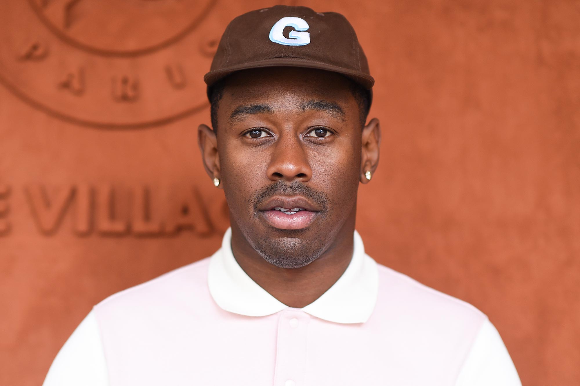 To see what the rapper Tyler The Creator wears, visit Drew Merch and Full Sent Merch here